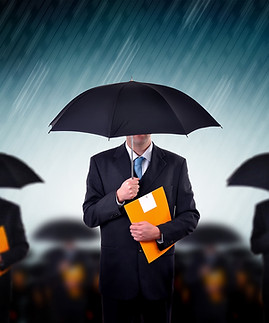 Businessmen with Umbrellas